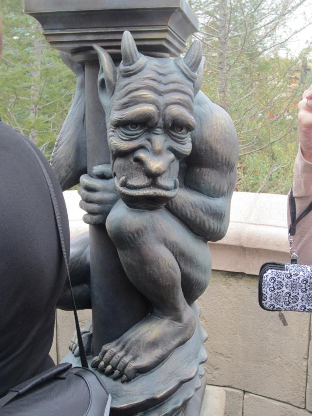 This poor gargoyle and his buddies have to hold up all the lamp posts along the bridge. He doesn't look too happy about it either.